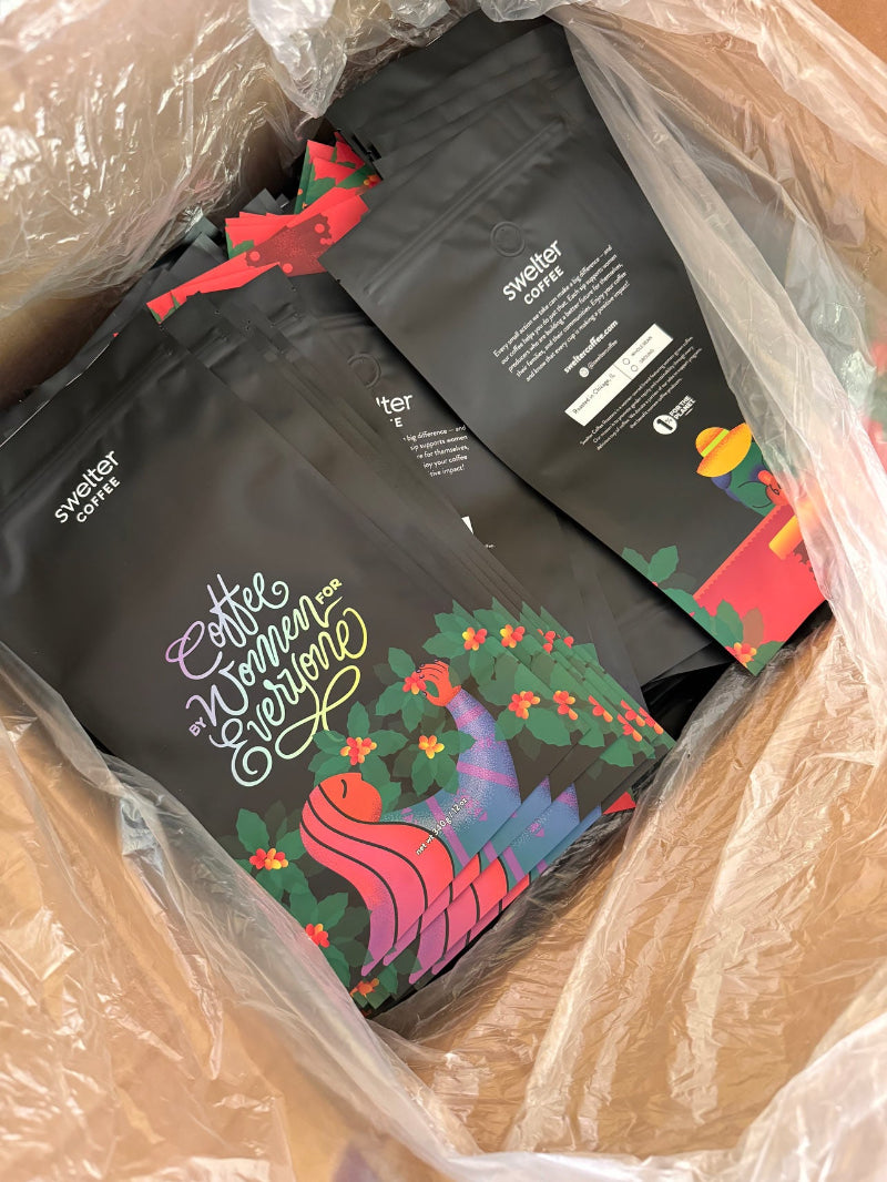 An overhead visual showing stacks of 12oz bags for coffee, empty, ready to be used.